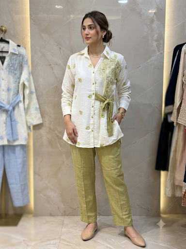 Sage Paisley white button-front shirt with sage paisley embellishments, a tie belt and matching trousers